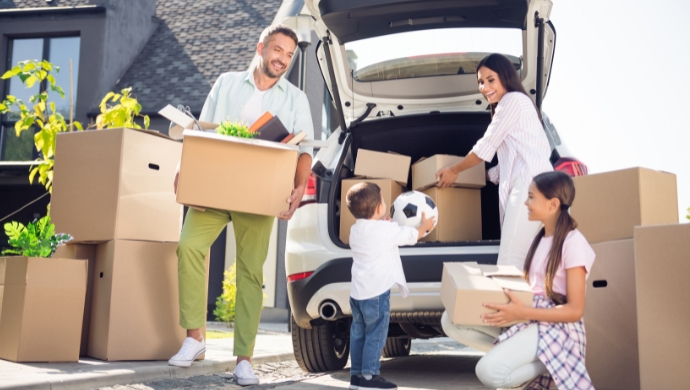 family with moving boxes